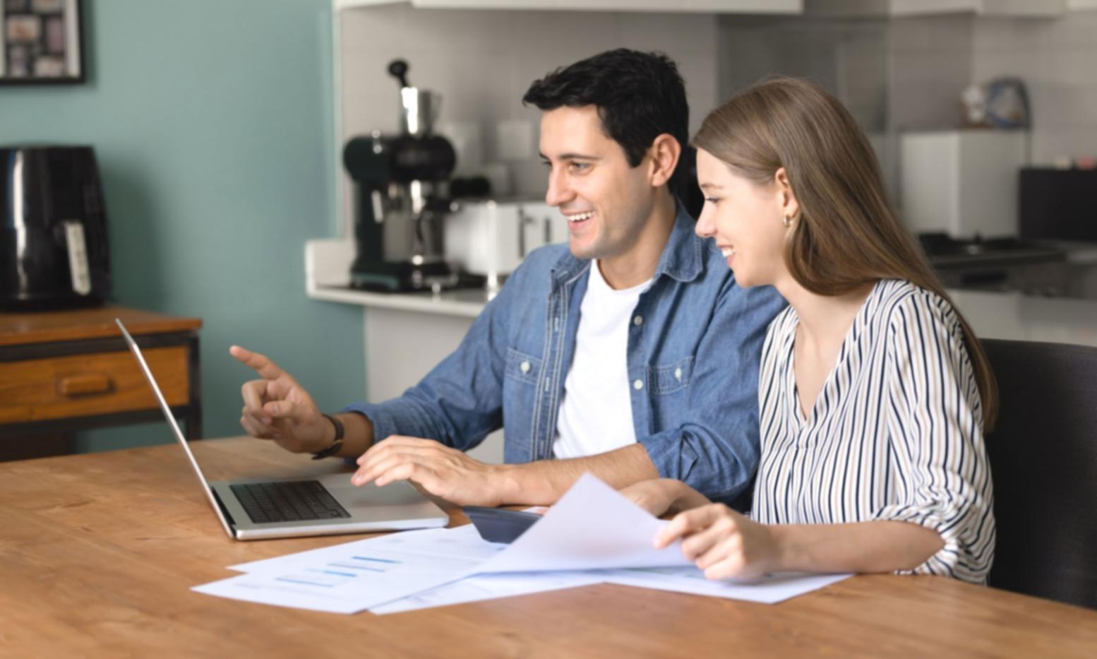 Workshop participants engaged in hands-on financial planning exercise